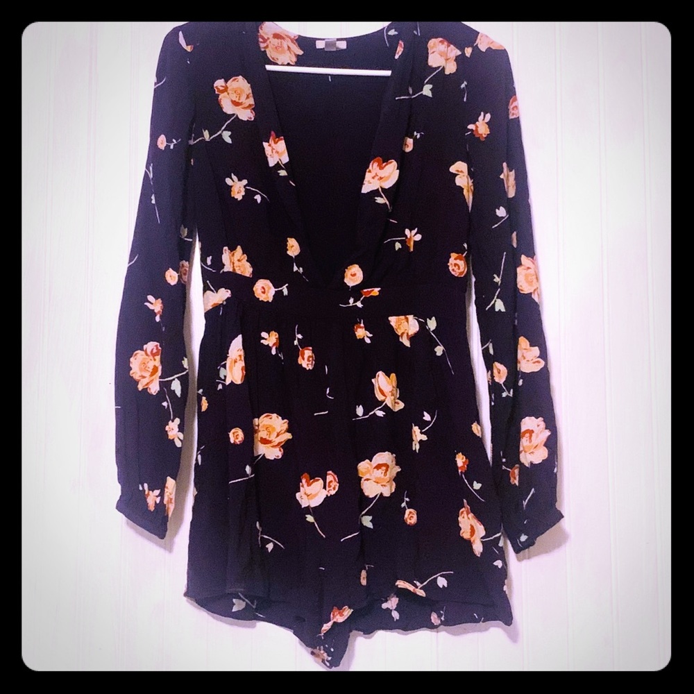 Adorable Navy Blue Floral Romper!